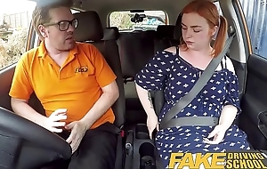 Fake Driving School Voluptuous redhead fucks in wheels